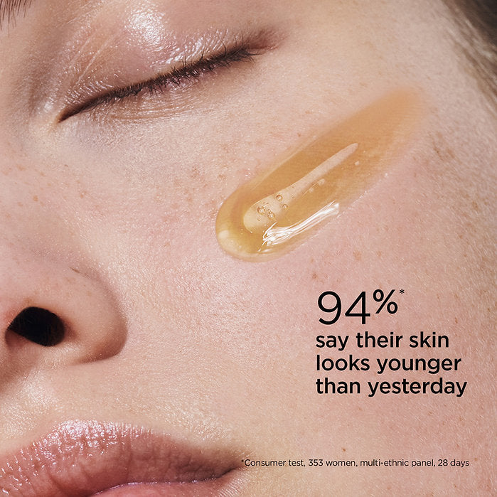 Refect Beauty Clarins Double Serum dual-phase formula applied on a woman's cheek for youthful, radiant skin
