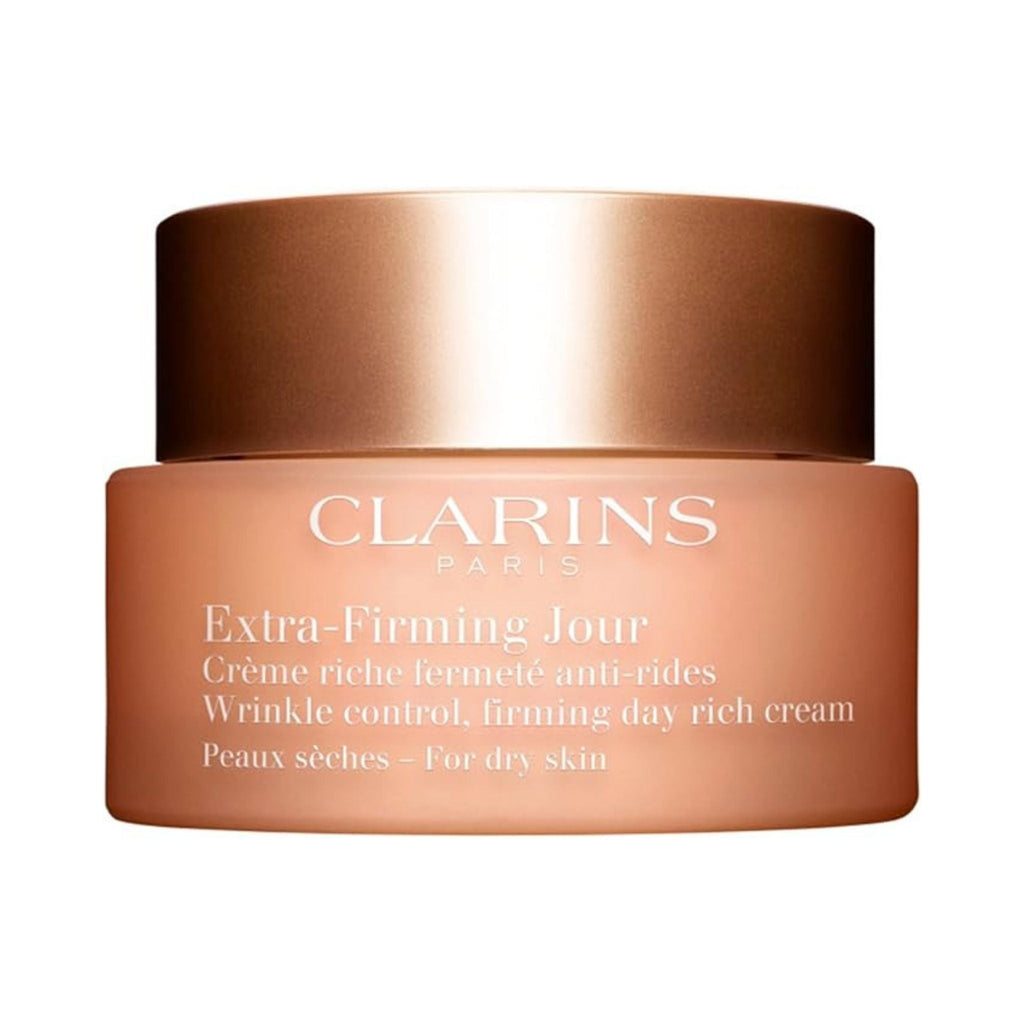 Refect Beauty Clarins Extra Firming Jour Day Rich Cream for dry skin in a peach-toned jar with a metallic bronze lid.