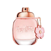 Refect Beauty Coach Floral Eau de Parfum in a pink glass bottle with a signature flower charm and gold cap
