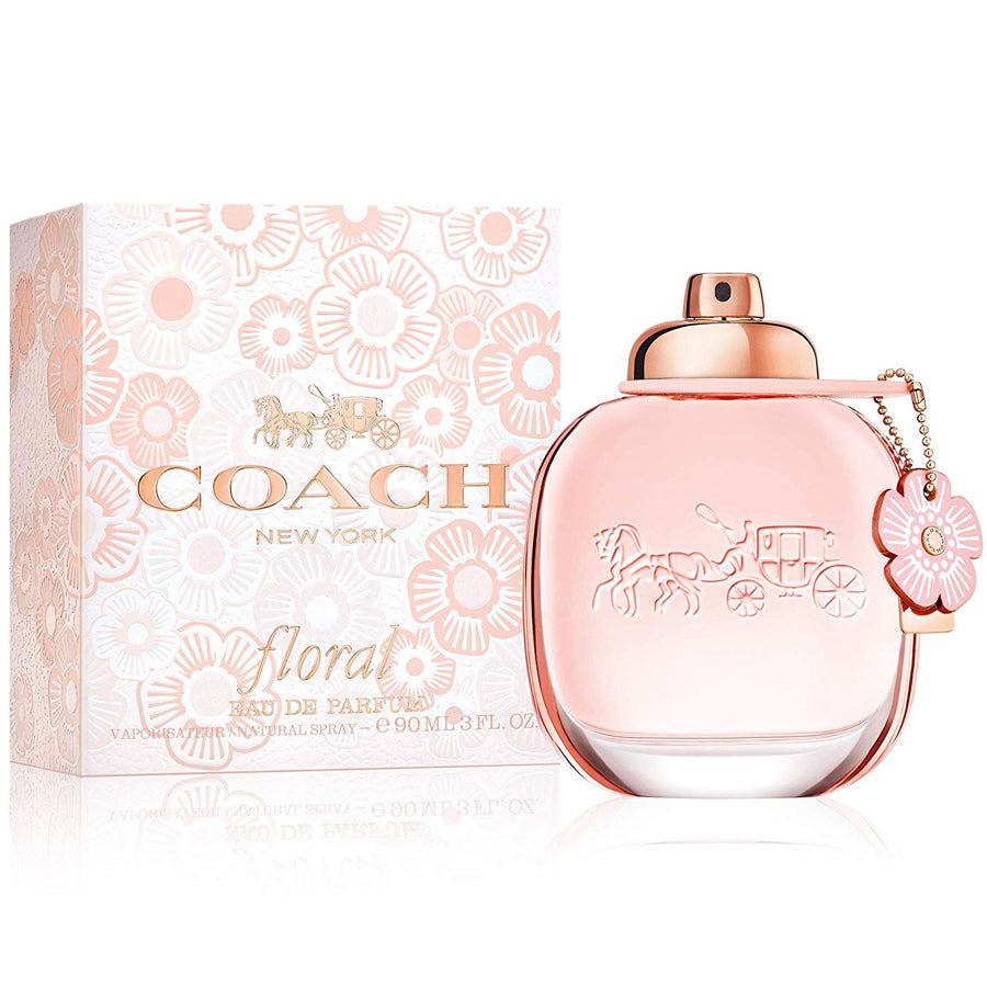 Refect Beauty Coach Floral Eau de Parfum bottle with pink glass and flower charm next to its matching floral box