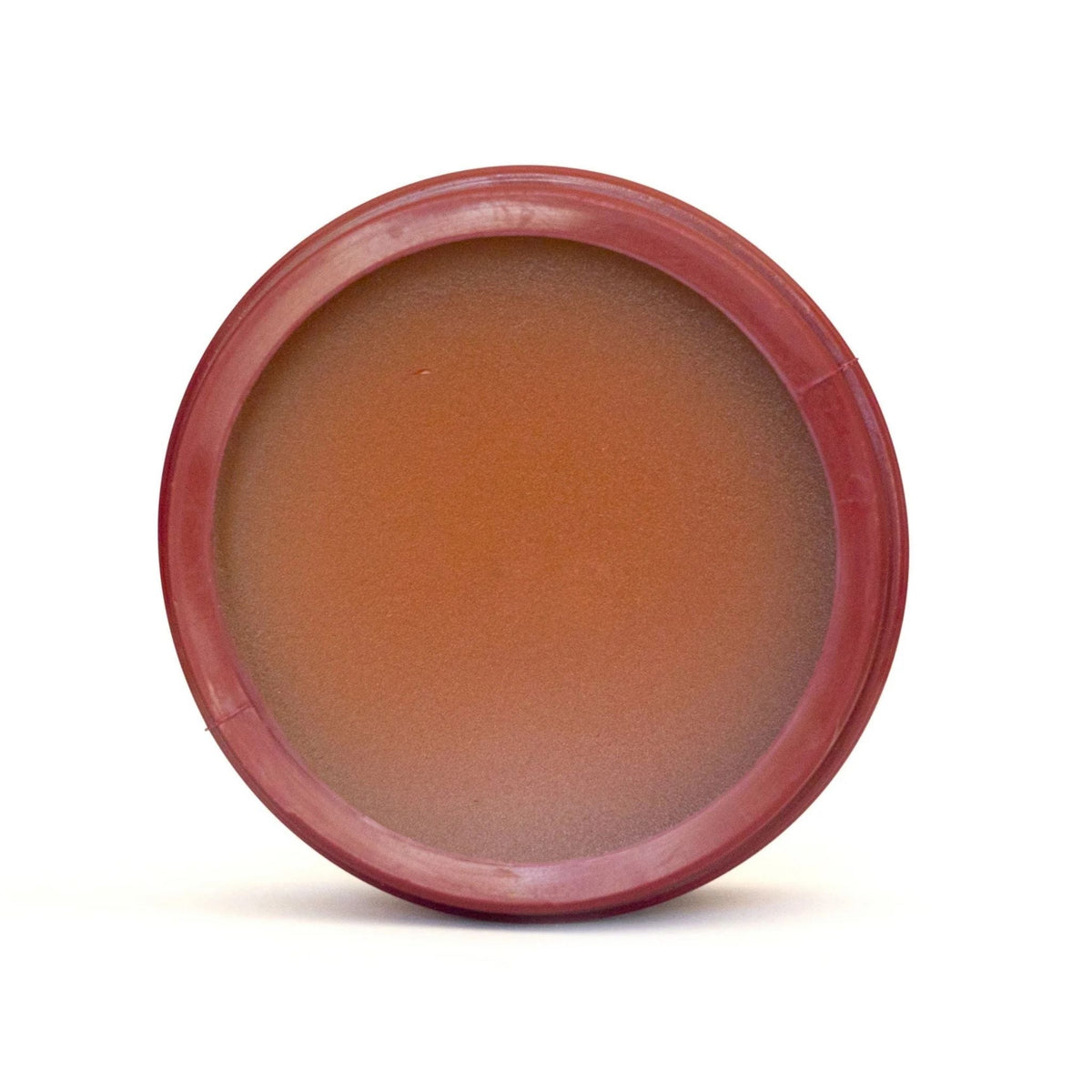 Refect Beauty Carrot Sun Cocoa Butter tanning cream in a round brown container with a rich, smooth texture.