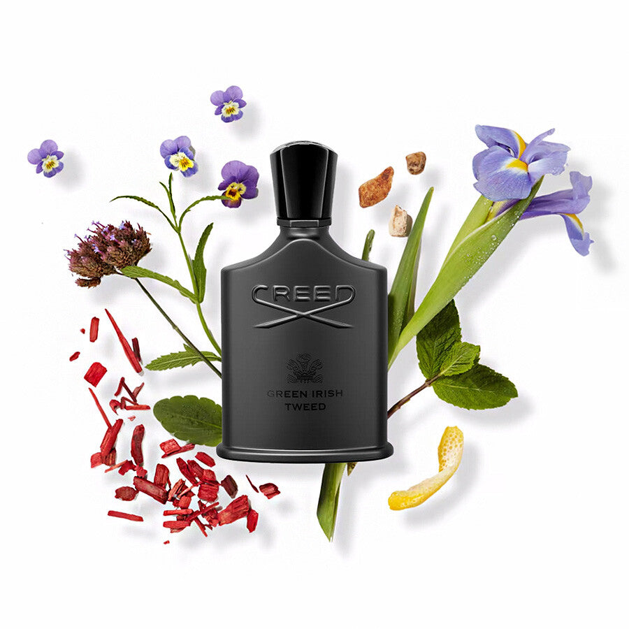 Refect Beauty CREED Green Irish Tweed perfume bottle surrounded by iris, violet leaves, sandalwood, and lemon peel.