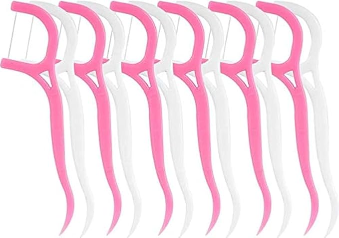 Refect Beauty dental floss picks in pink and white for daily oral hygiene and plaque removal between teeth