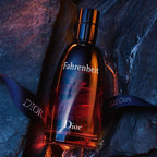 Refect Beauty Dior Fahrenheit Eau de Toilette bottle with gradient red and orange glass on a dark stone background