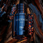 Refect Beauty Dior Sauvage Elixir perfume bottle in dark blue glass surrounded by lavender and rustic wood elements