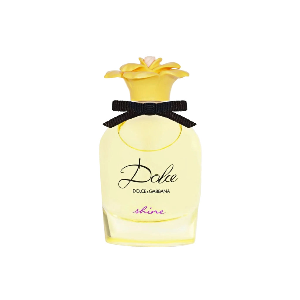 Refect Beauty Dolce & Gabbana Dolce Shine Eau de Parfum in a yellow glass bottle with a floral cap and black ribbon.