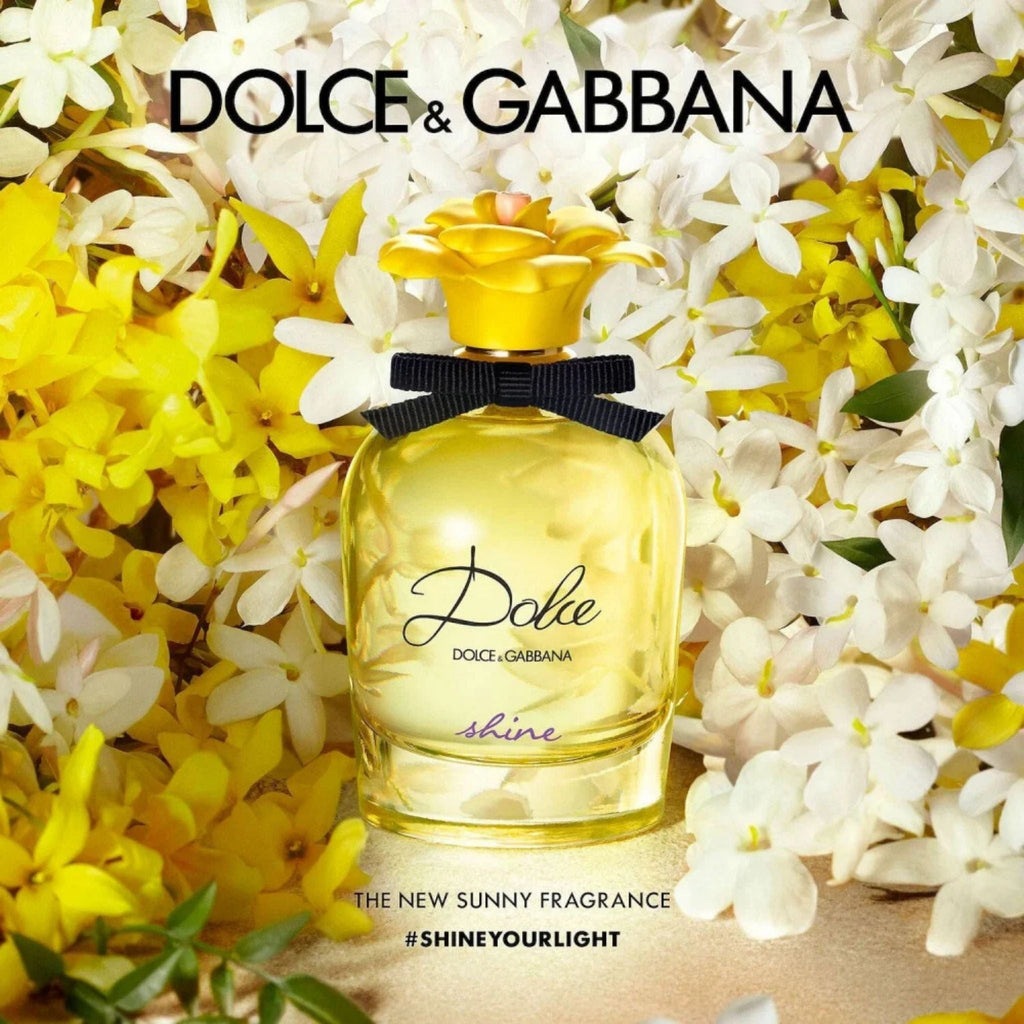 Refect Beauty Dolce & Gabbana Dolce Shine Eau de Parfum bottle with a yellow flower cap surrounded by white flowers.