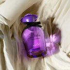 Refect Beauty Dolce & Gabbana Dolce Violet Eau de Toilette in a purple glass bottle with a violet-shaped cap.