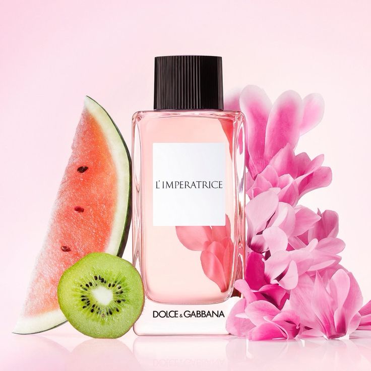Refect Beauty Dolce & Gabbana L’Impératrice eau de toilette with watermelon, kiwi, and pink flowers on a pink background