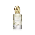 Refect Beauty Donna Karan Cashmere & Tunisian Neroli Eau de Parfum in a clear glass bottle with a gold sculptural cap.