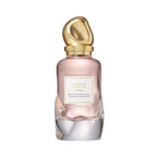 Refect Beauty Donna Karan Cashmere & Wild Fig Eau de Parfum in a sleek glass bottle with a gold sculptural cap.
