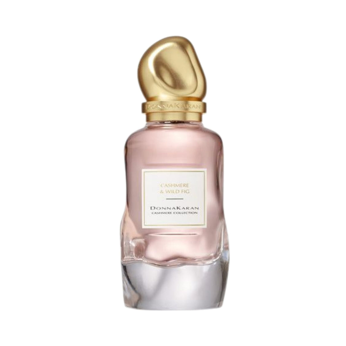 Refect Beauty Donna Karan Cashmere & Wild Fig Eau de Parfum in a sleek glass bottle with a gold sculptural cap.