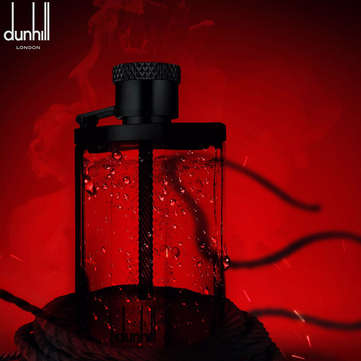 Refect Beauty Dunhill Desire Red Extreme fragrance bottle with a sleek black cap against a dramatic red background