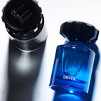 Refect Beauty Dunhill Driven Blue Eau de Toilette in a vibrant blue glass bottle with a black cap on a white surface.