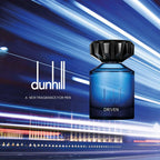 Refect Beauty Dunhill Driven Blue Eau de Toilette in a sleek blue glass bottle against a blurred city light background