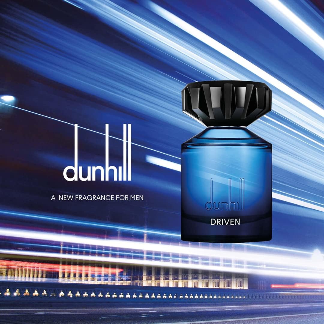 Refect Beauty Dunhill Driven Blue Eau de Toilette in a sleek blue glass bottle against a blurred city light background