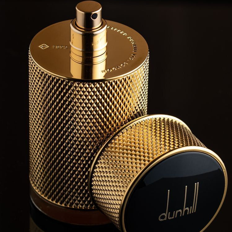 Refect Beauty Dunhill Icon Absolute Eau de Parfum in a cylindrical gold bottle with a textured diamond pattern