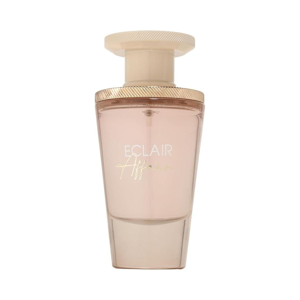Refect Beauty French Avenue Eclair Affair eau de parfum in a tapered glass bottle with a beige cap and gold detail.