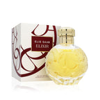 Refect Beauty Elie Saab Elixir Eau de Parfum in a round glass bottle with gold cap next to its white patterned box.