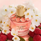 Refect Beauty Elie Saab Girl of Now Forever perfume bottle surrounded by white flowers and fresh raspberries