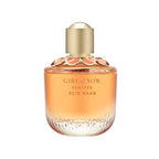 Refect Beauty Elie Saab Girl of Now Forever Eau de Parfum in a glass bottle with a gold cap and floral accents.