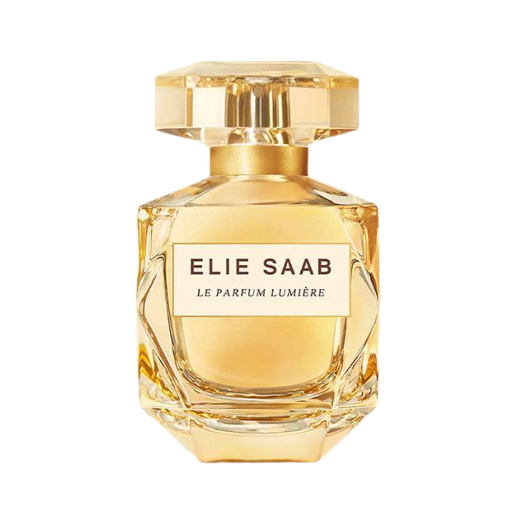 Refect Beauty Elie Saab Le Parfum Lumière Eau de Parfum in a faceted glass bottle with a golden cap and amber liquid.