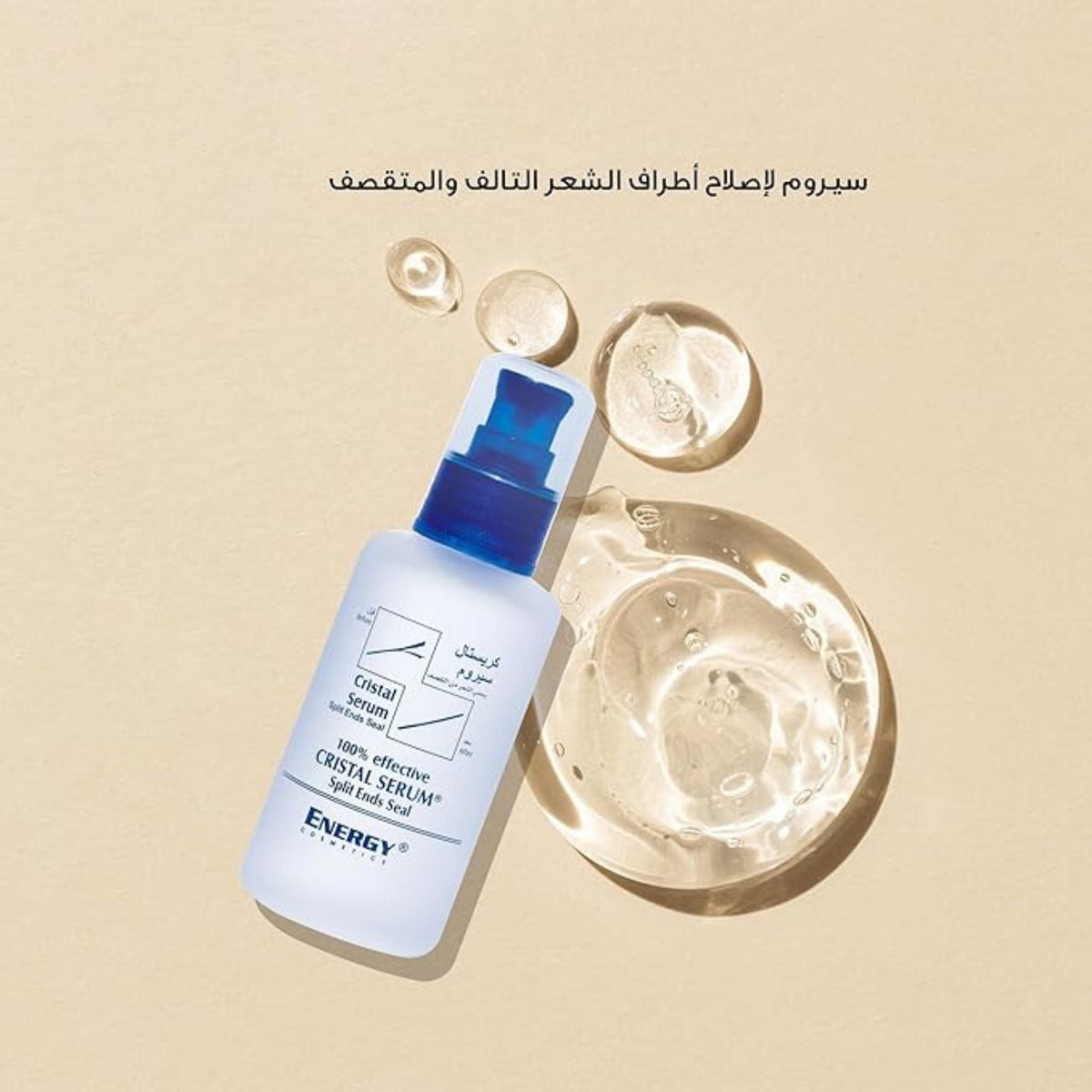 Refect Beauty Energy Cristal Serum bottle with clear hair serum droplets on a beige background
