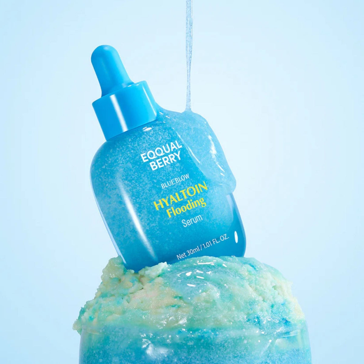 Refect Beauty Eqqualberry Hyaltoin Flooding Serum bottle with blue gel texture dripping over a frozen icy base