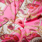 Refect Beauty Escada Candy Love heart-shaped perfume bottle nestled in pink floral and chain print silk fabric