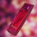Refect Beauty Escada Magnetism Eau de Parfum in a vibrant magenta glass bottle with a sleek, angular design.