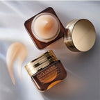 Refect Beauty Estée Lauder Advanced Night Repair Eye Supercharged Gel-Crème jars with gold lids on a silk background