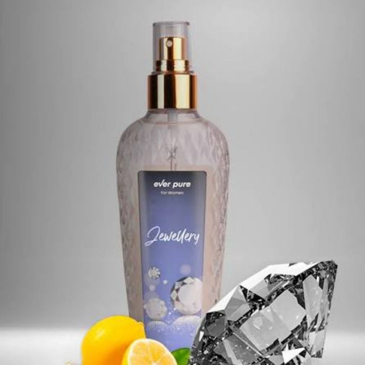 Refect Beauty Ever Pure Jewellery body mist in a clear textured bottle with gold cap, featuring lemon and diamond art.