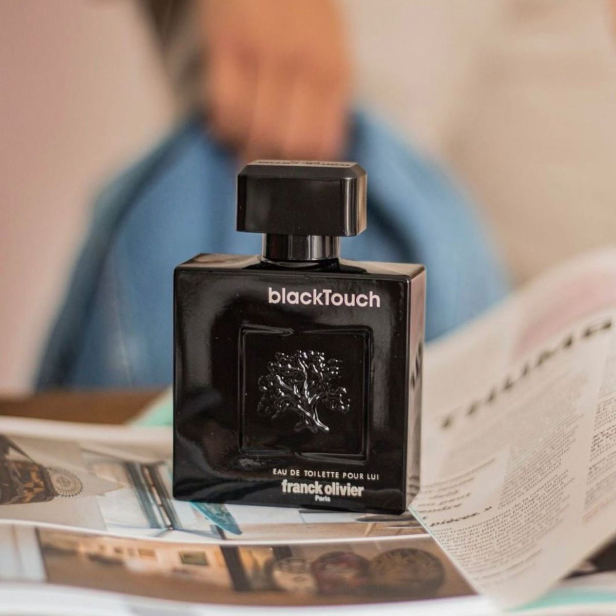 Refect Beauty Franck Olivier Black Touch Eau de Toilette in a sleek black square bottle with an embossed tree design