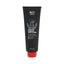 Refect Beauty Hair Addict Frizz Off leave-in conditioner in a black squeeze tube with a red cap for frizz control.