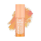 Refect Beauty Gabrini nourishing lip oil in a clear bottle with a peach cap and a glossy finish Peach