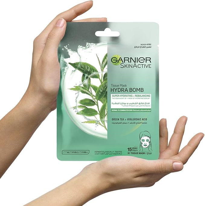 Refect Beauty Garnier Green Tea hydrating tissue mask for normal to oily skin held in hands
