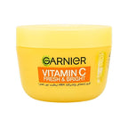 Refect Beauty Garnier Vitamin C Fresh & Bright face moisturizer in a yellow jar for radiant and hydrated skin.