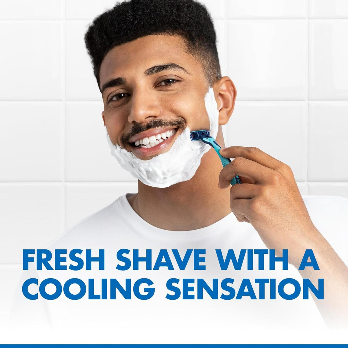 Refect Beauty Gillette Blue3 Cool disposable razor used by a smiling man with shaving foam on his face