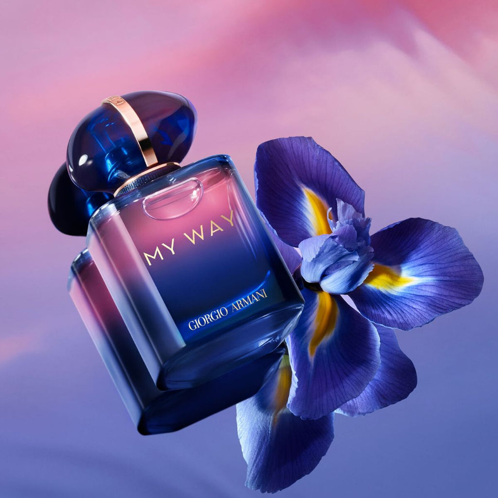 Refect Beauty Giorgio Armani My Way Le Parfum bottle with a blue and pink gradient glass next to a purple iris flower