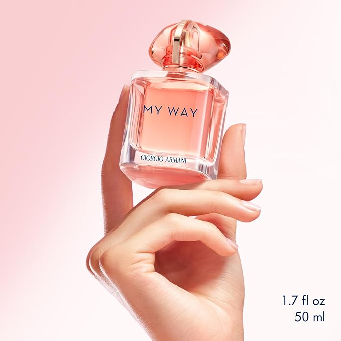 Refect Beauty Giorgio Armani My Way Ylang floral perfume bottle held in a hand against a soft pink background