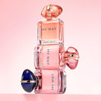 Refect Beauty Giorgio Armani My Way Ylang perfume bottles stacked against a soft pink background