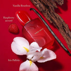 Refect Beauty Giorgio Armani Sì Passione Red Bloom perfume bottle surrounded by vanilla, raspberry, and iris flowers.