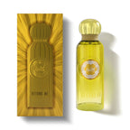 Refect Beauty Gissah Beyond Me Eau de Parfum in a clear glass bottle with a gold cap next to its matching gold box.