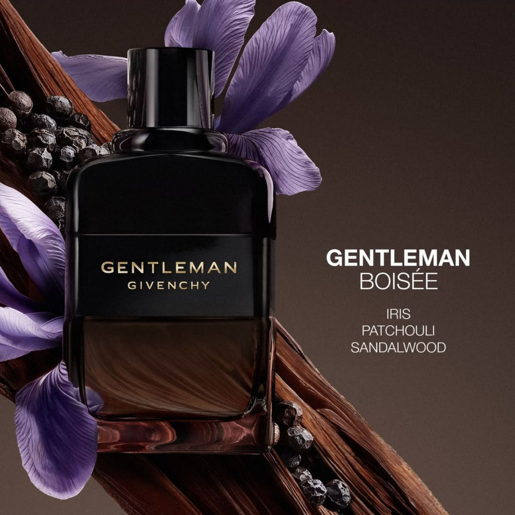 Refect Beauty Givenchy Gentleman Boisée Eau de Parfum bottle surrounded by iris flowers, sandalwood, and black pepper.