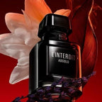 Refect Beauty Givenchy L'Interdit Absolu intense eau de parfum in a sleek black bottle against a dark red floral background