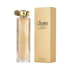 Refect Beauty Givenchy Organza Eau de Parfum bottle with gold sculptural cap next to its elegant gold packaging box.