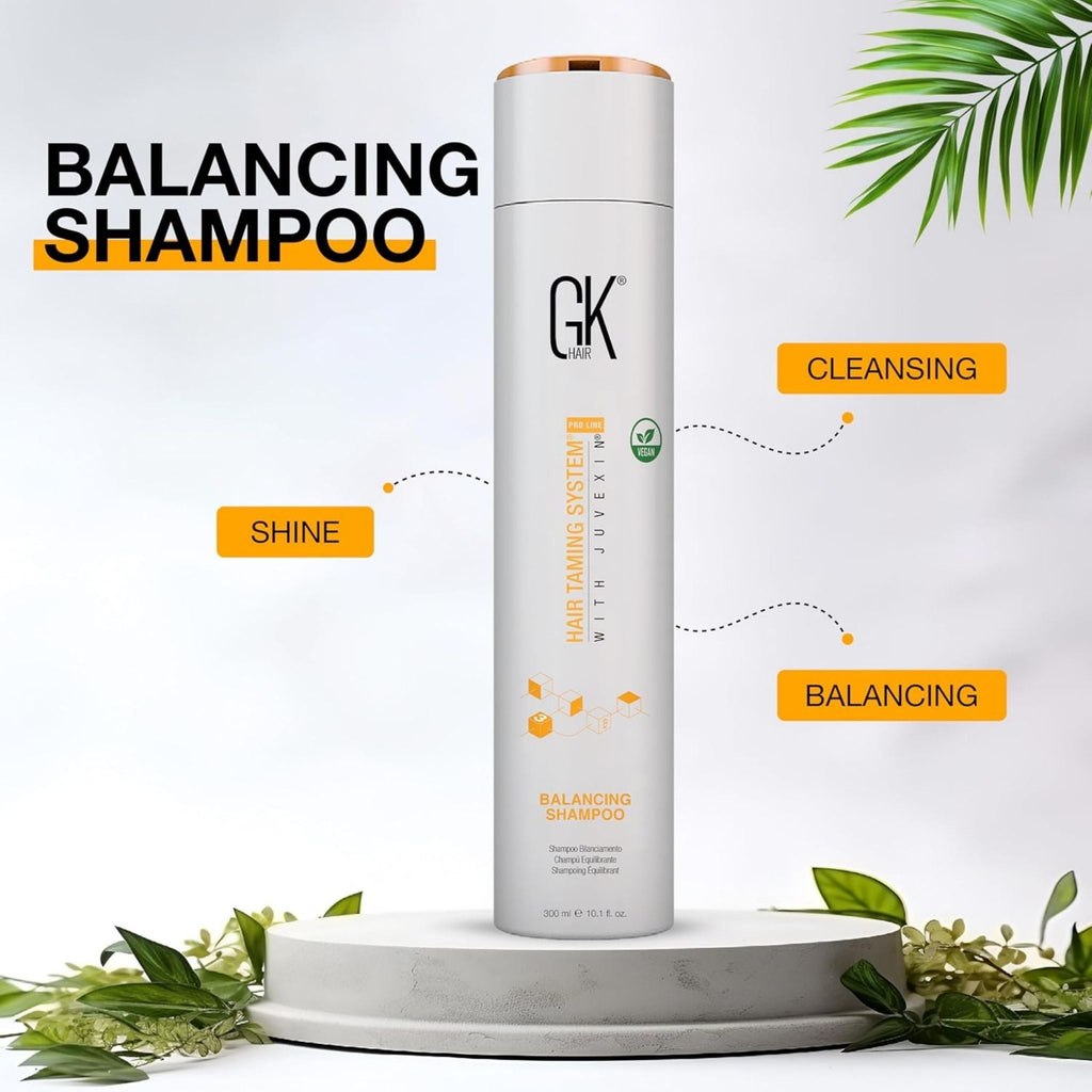 Refect Beauty GK Balancing Shampoo bottle on a pedestal with botanical accents, highlighting shine and cleansing.