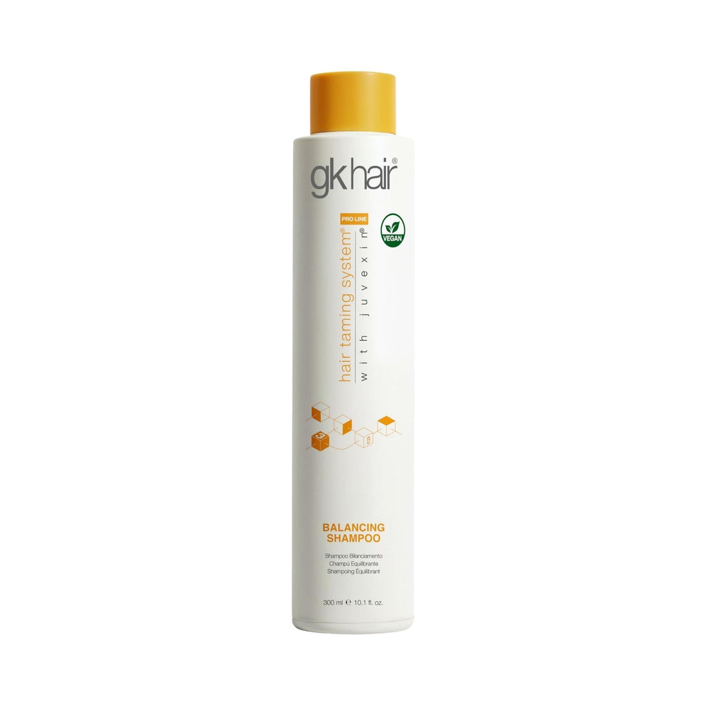 Refect Beauty GK Balancing Shampoo in a white bottle with a yellow cap, featuring Juvexin keratin for hair care.