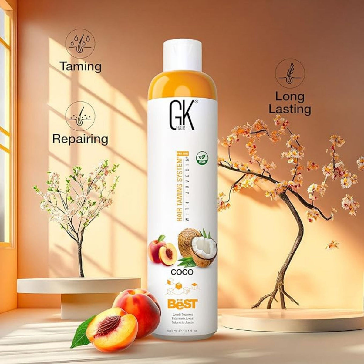 Refect Beauty GK Hair The Best smoothing treatment bottle with coconut and peach accents in a sunny studio setting.