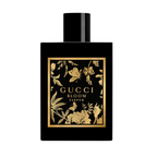 Refect Beauty Gucci Bloom Parfum bottle featuring a black glass design with elegant gold floral and butterfly motifs.